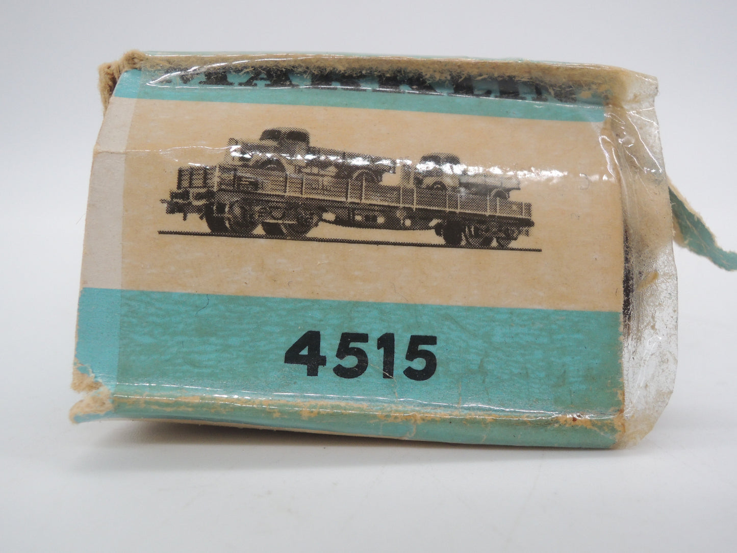 Märklin H0 - 4515 - 4-assige lageboordwagen met 2 trucks beladen van de DB