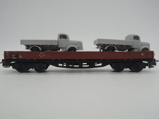 Märklin H0 - 4515 - 4-assige lageboordwagen met 2 trucks beladen van de DB
