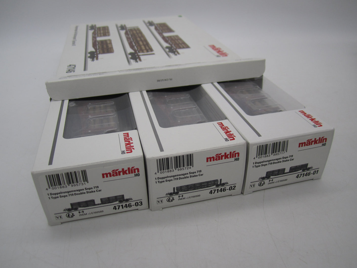 Märklin H0 - 47146 - 3-delige set van 4-assige rongenwagen, met houtlading van de DB