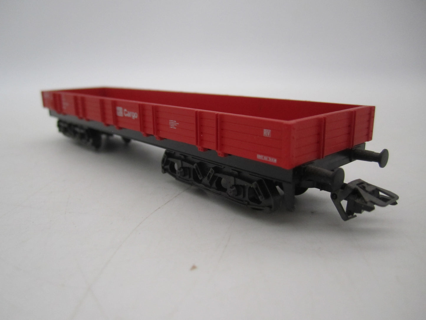 Märklin H0 - Uit set 44504 - 4-assige lageboordwagen in rood van de DB Cargo