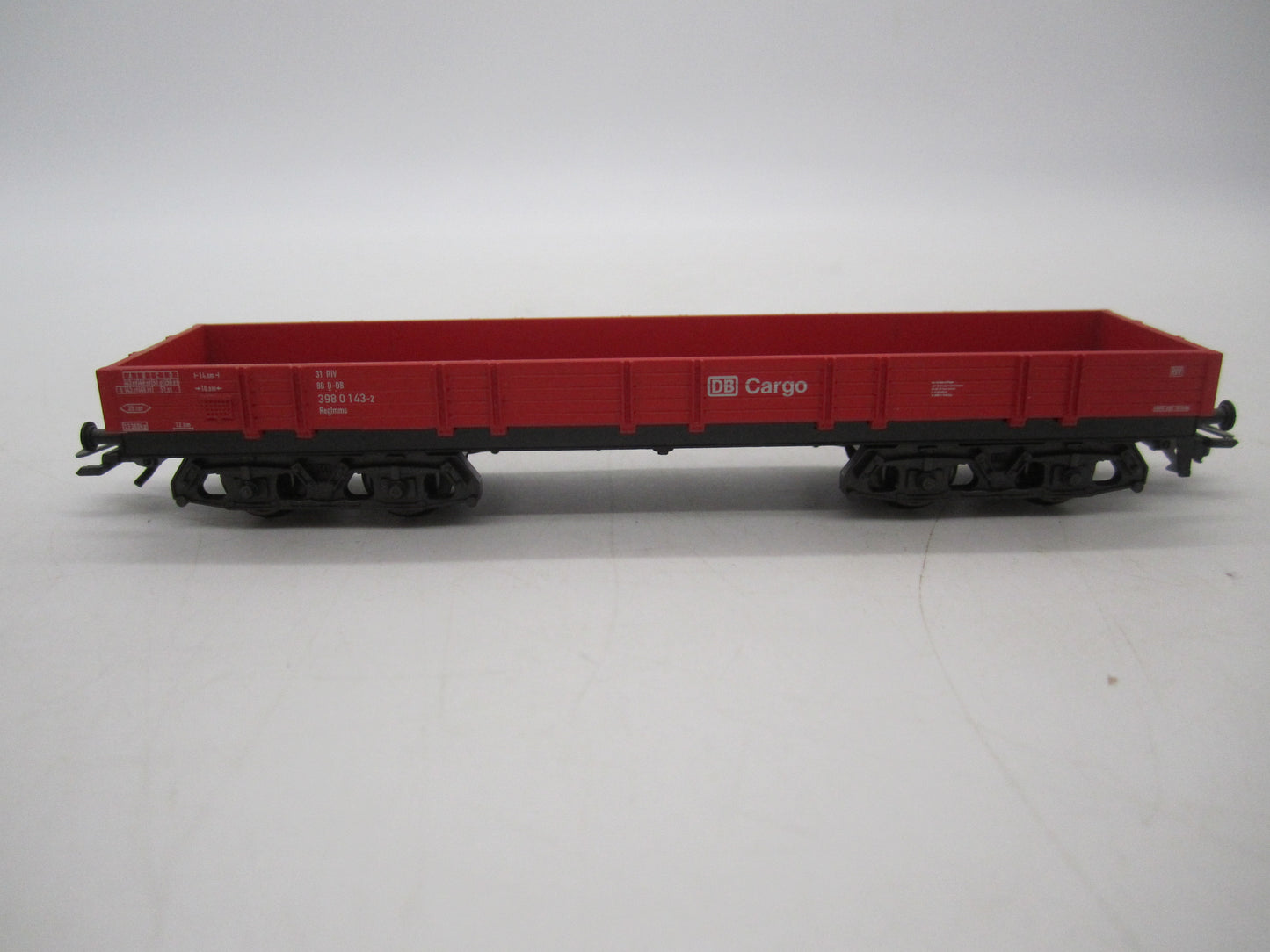 Märklin H0 - Uit set 44504 - 4-assige lageboordwagen in rood van de DB Cargo