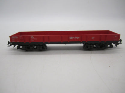 Märklin H0 - Uit set 44504 - 4-assige lageboordwagen in rood van de DB Cargo