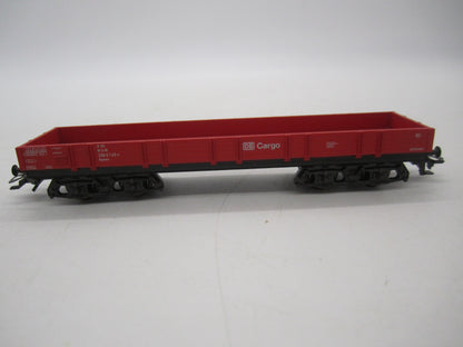 Märklin H0 - Uit set 44504 - 4-assige lageboordwagen in rood van de DB Cargo