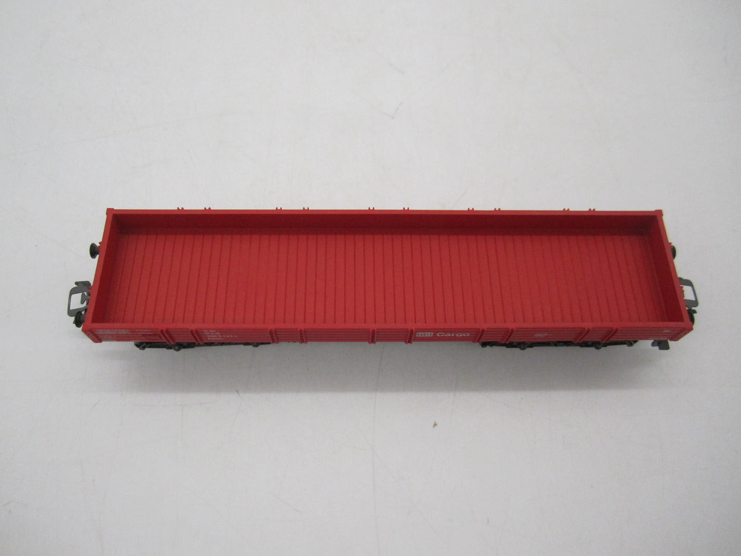 Märklin H0 - Uit set 44504 - 4-assige lageboordwagen in rood van de DB Cargo