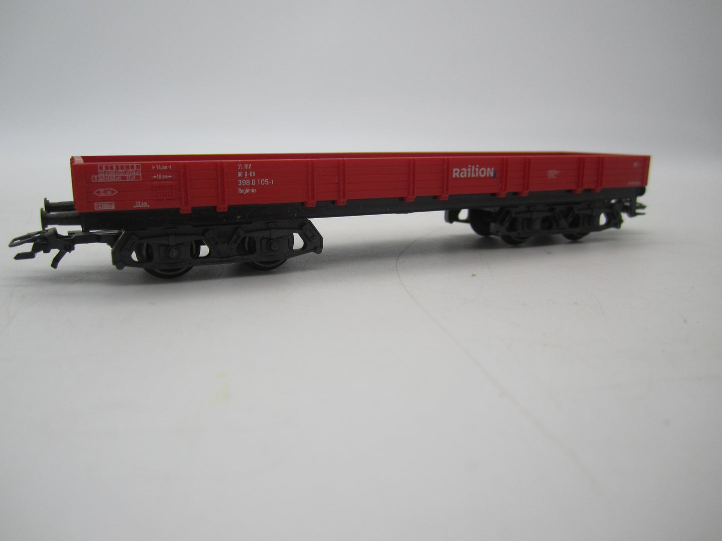 Märklin H0 - 4-assige lageboordwagen in rood van Railion