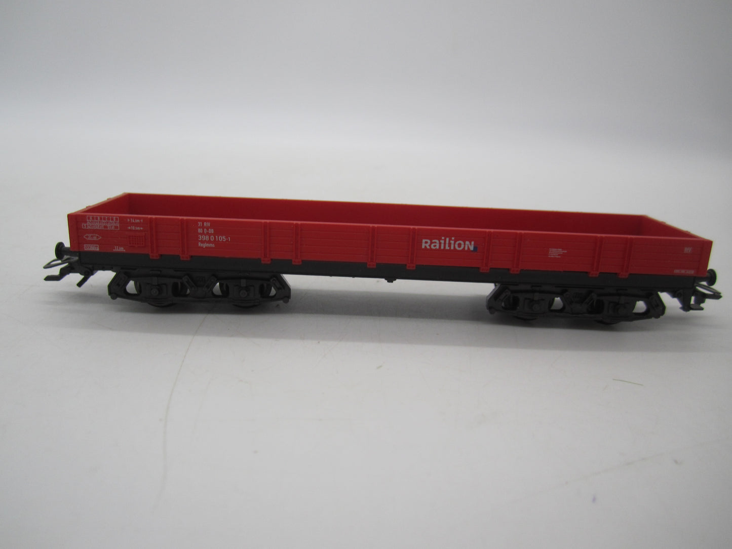 Märklin H0 - 4-assige lageboordwagen in rood van Railion