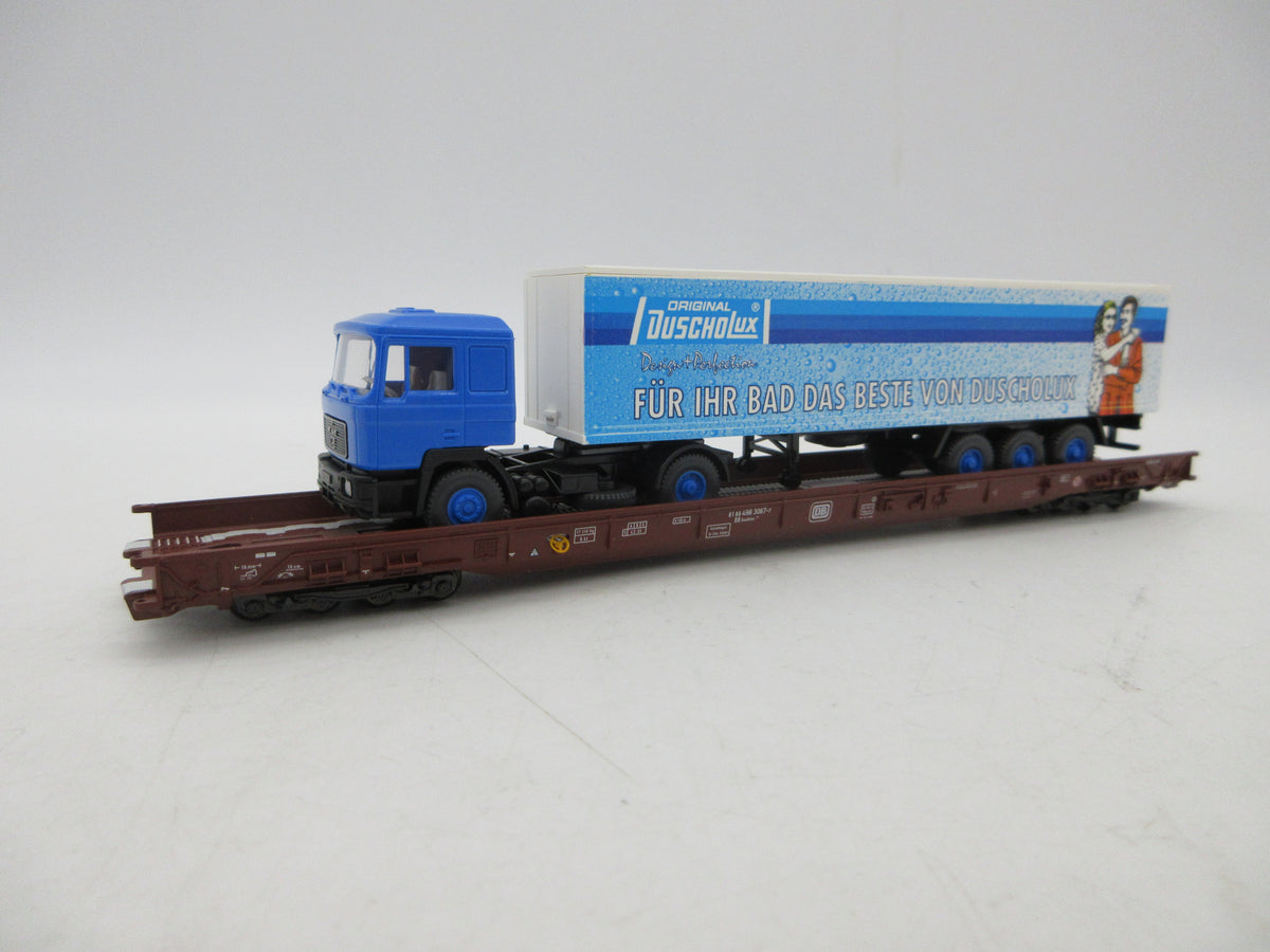 Märklin H0 - 4842 - Lagevloerwagen "Rollende Landstrasse" van de DB, met auto