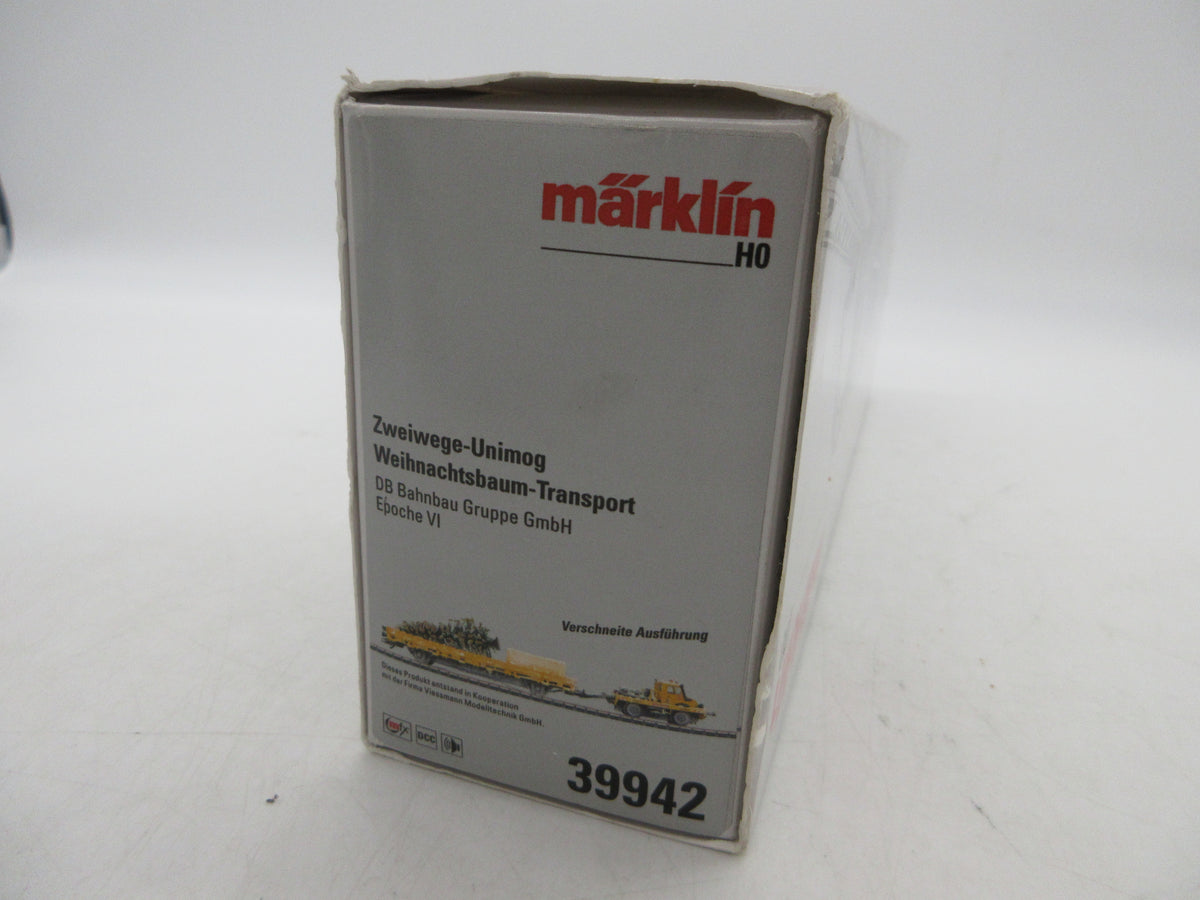 Märklin H0 - 39942 - Tweeweg Unimog met kerstboom "Kersttransport" - MFX+/Sound