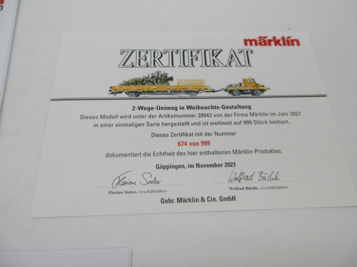 Märklin H0 - 39942 - Tweeweg Unimog met kerstboom "Kersttransport" - MFX+/Sound