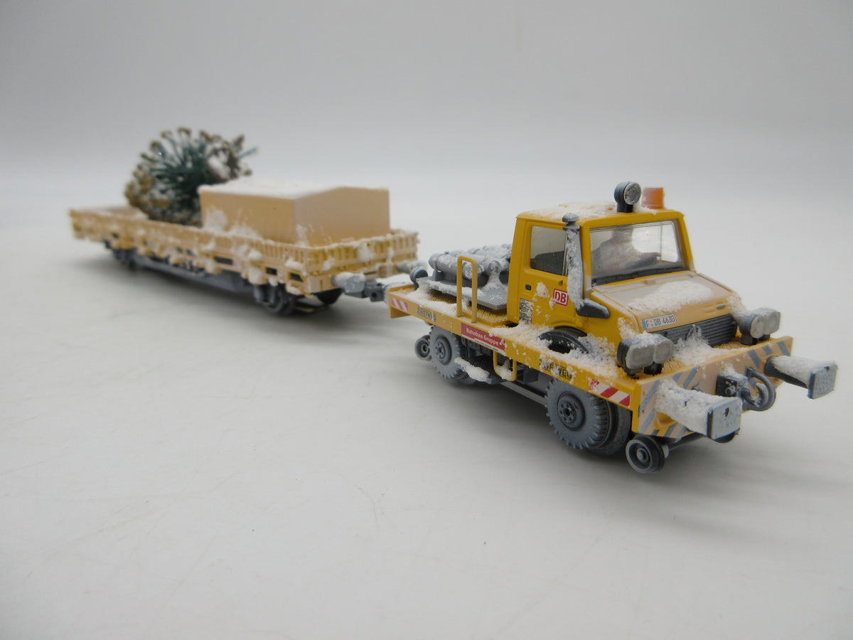 Märklin H0 - 39942 - Tweeweg Unimog met kerstboom "Kersttransport" - MFX+/Sound