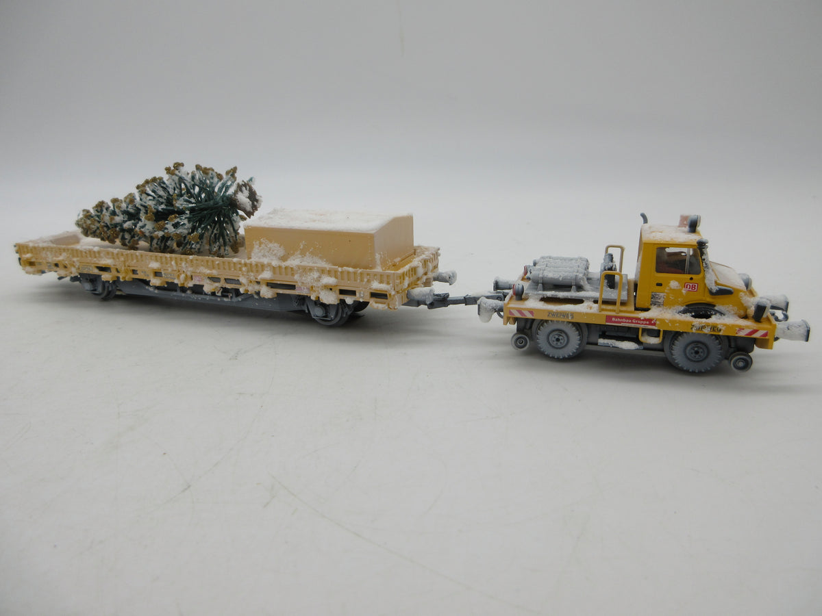 Märklin H0 - 39942 - Tweeweg Unimog met kerstboom "Kersttransport" - MFX+/Sound