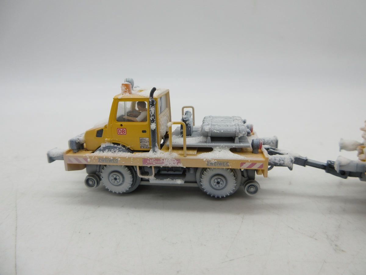 Märklin H0 - 39942 - Tweeweg Unimog met kerstboom "Kersttransport" - MFX+/Sound