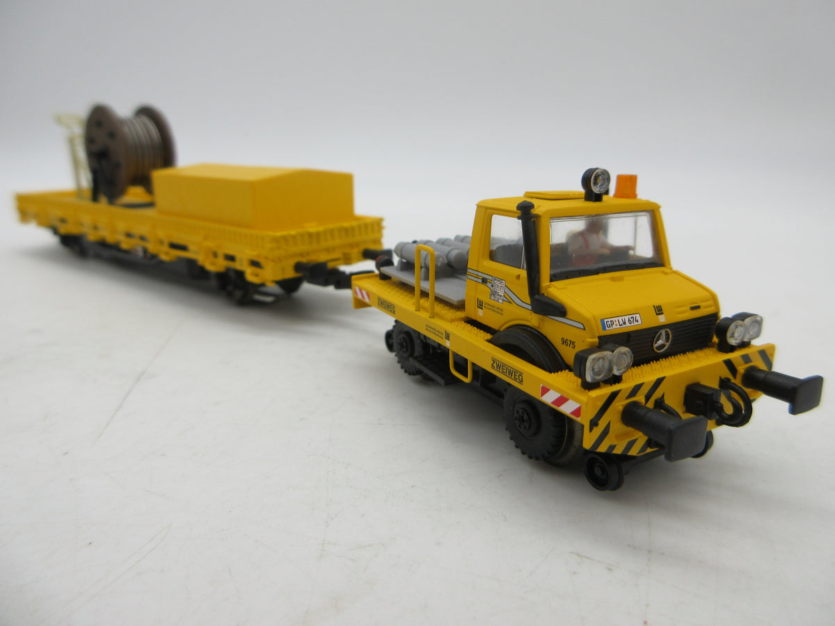 Märklin H0 - 39941 - Tweeweg Unimog van Leonard Weiss GmbH & Co. KG - MFX+/Sound