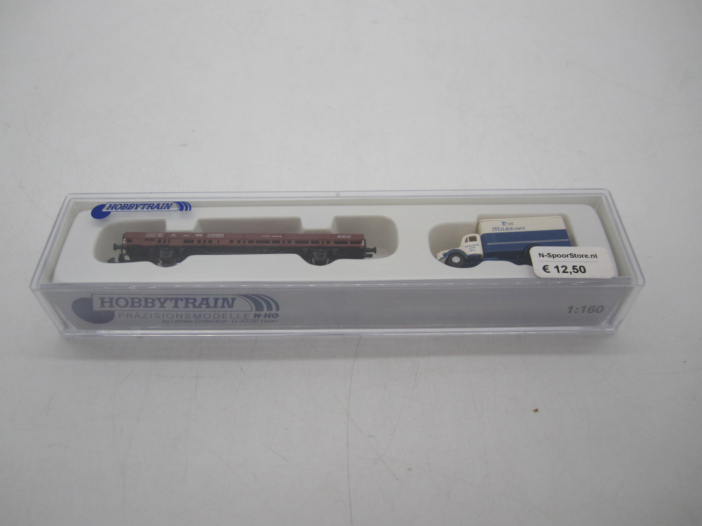 Hobbytrain N - H23817 - Platte wagen met truck "der Milchbauer" van de DB
